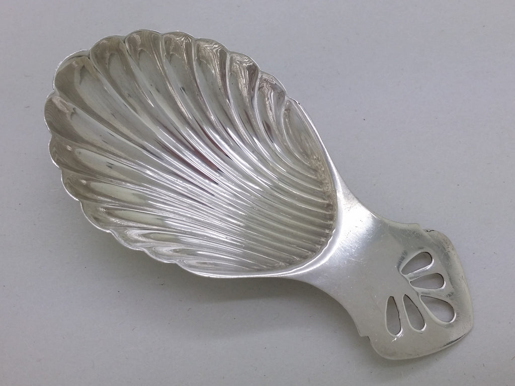 Elizabeth II 1973 sterling silver scalloped caddy spoon, Sheffield, by the Royal Irish Silver Co.