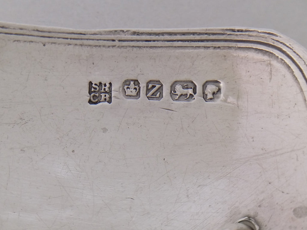 Sherry decanter label hallmarks: Samuel Roberts & Charles Belk makers mark SRCB; crown mark for Sheffield; Sheffield date letter Z for 1867; lion passant mark for sterling silver; and the Victoria duty mark.