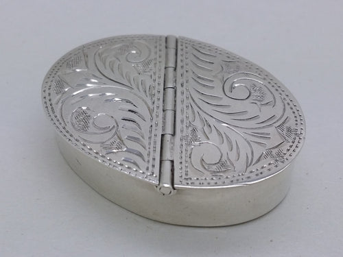Elizabeth II 1991 sterling silver double hinged oval pill box, London, by Ari D Norman