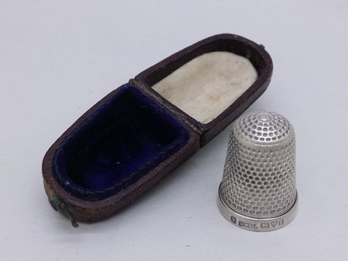 Edwardian 1905 cased sterling silver dimple thimble, Chester, by Henry Williamson Ltd