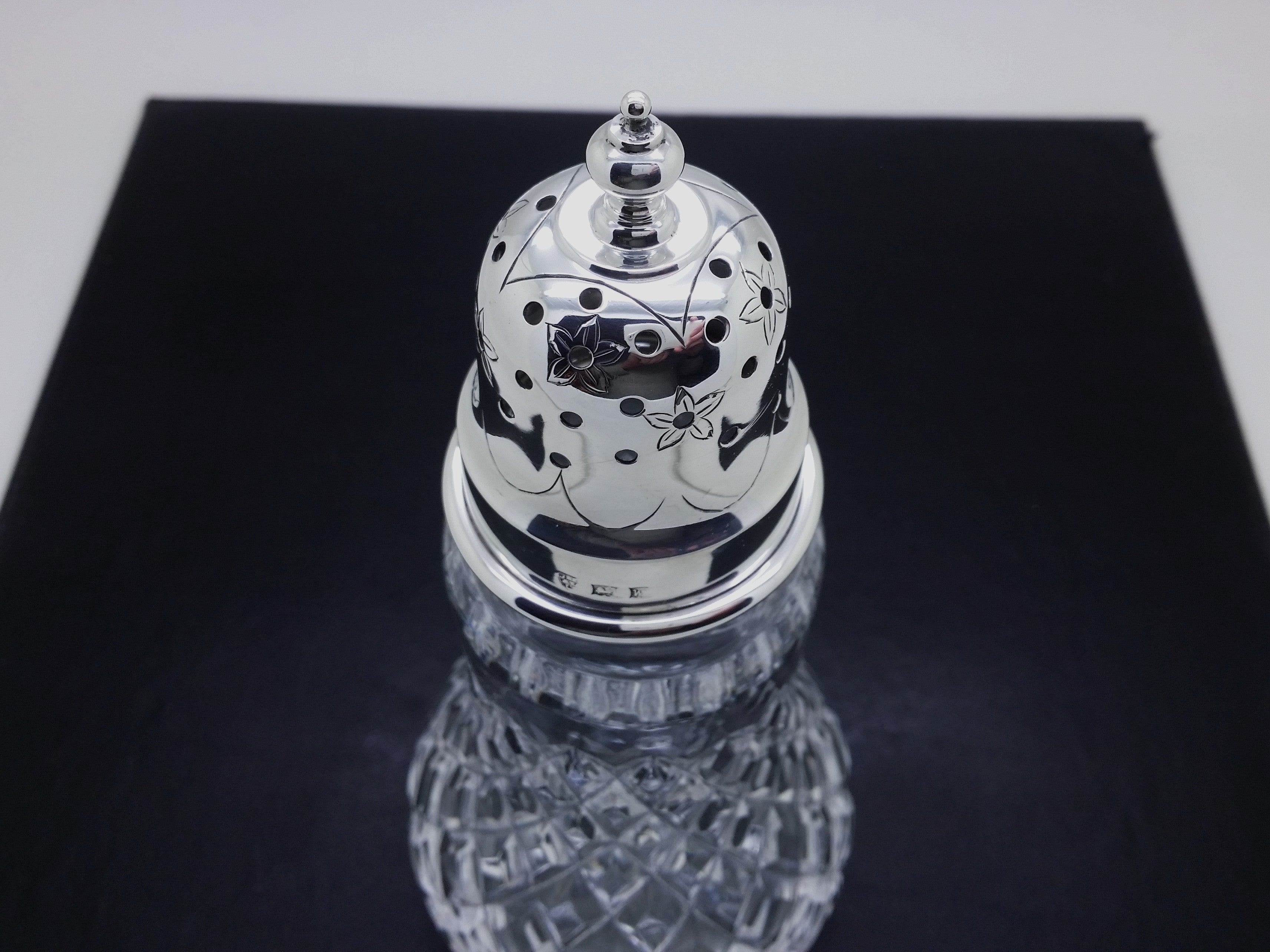 Sterling silver push-fit sugar caster lid with flower head engraving and a knop finial