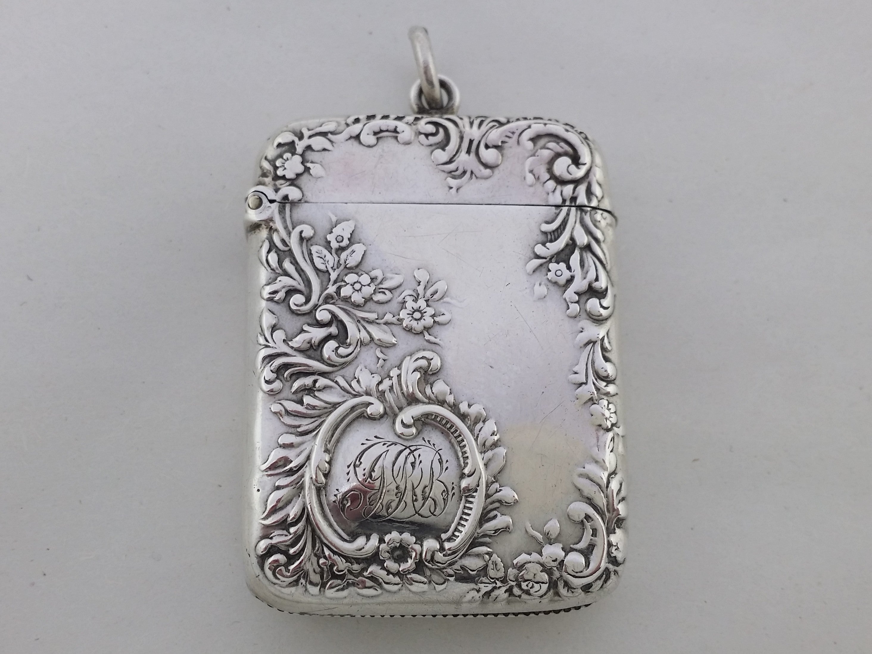 Victorian 1895 sterling silver floral & foliate vesta case, Birmingham by Edward Jacobs & Son