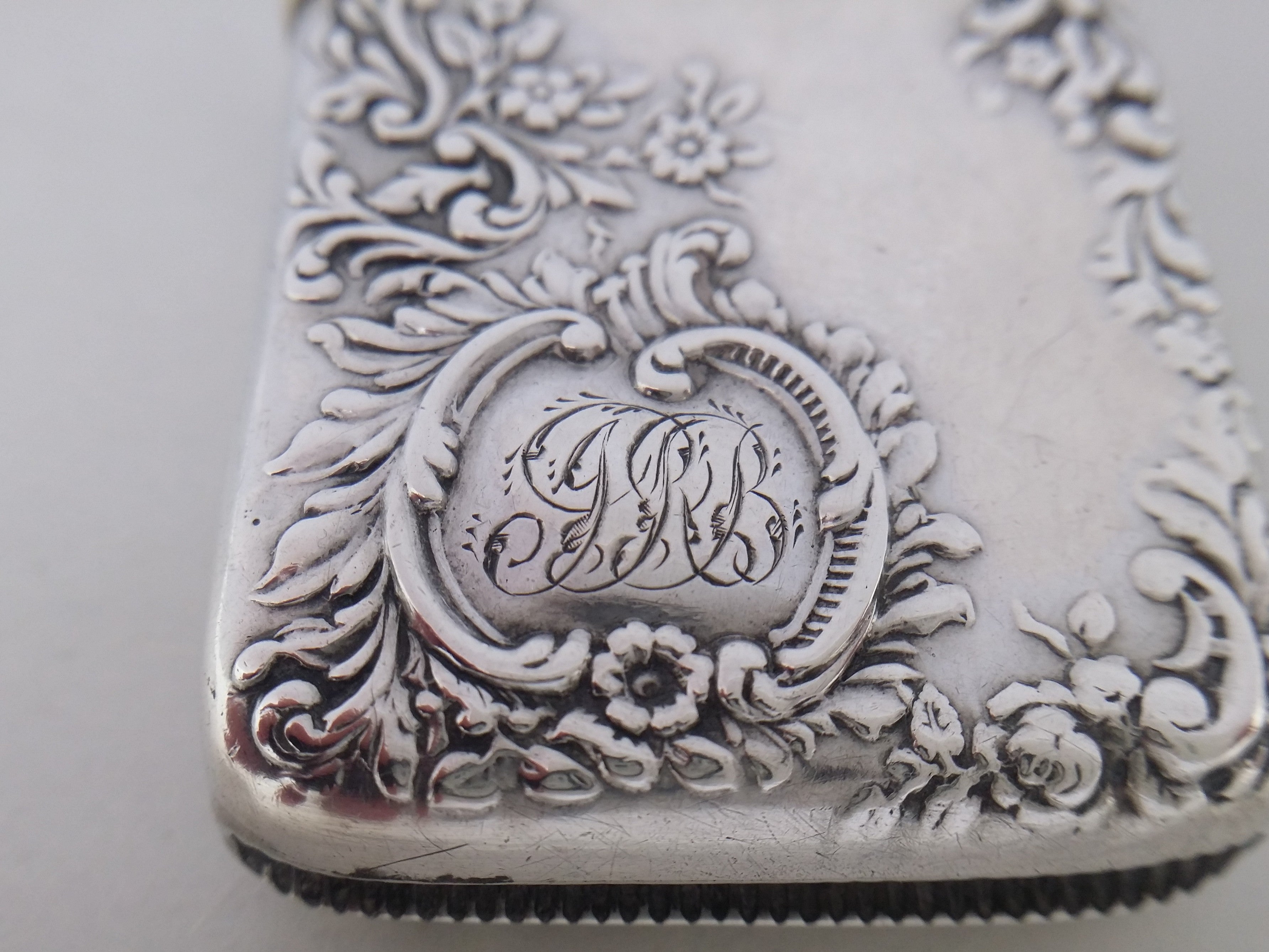IRB initial inscription to the scroll edged cartouche on sterling silver vesta case