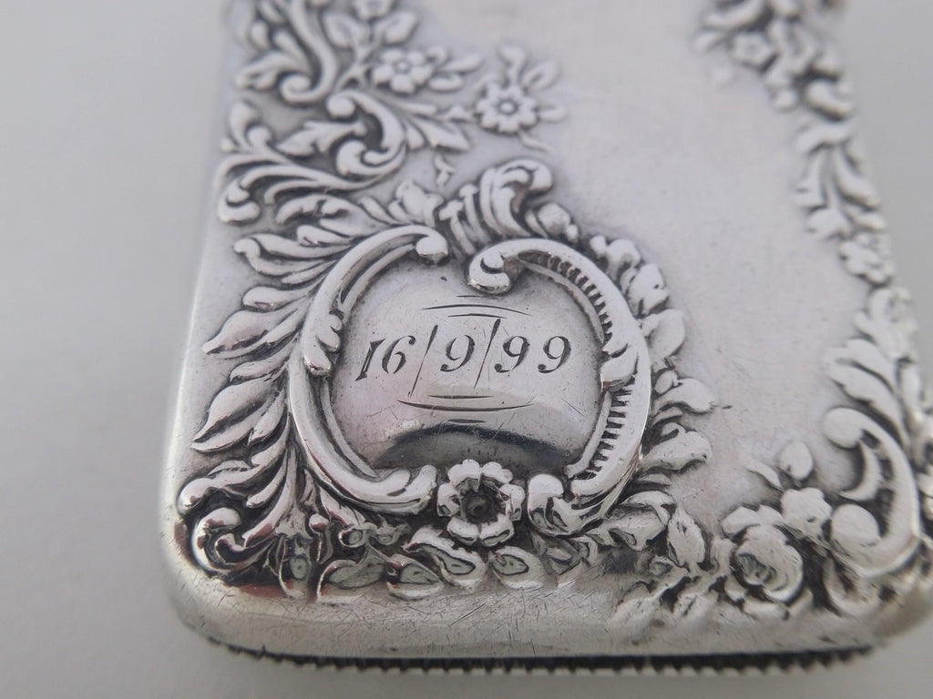 16/9/99 date inscription to the scroll edged cartouche on sterling silver vesta case