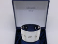 Elizabeth II c.2002 cased sterling silver napkin ring, Birmingham by Broadway & Co