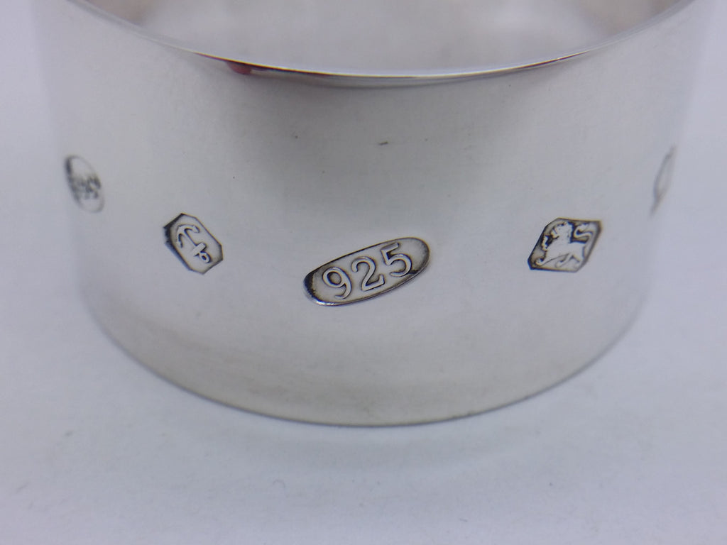 Napkin ring hallmarks: Broadway & Co maker's mark B&CO; anchor mark for Birmingham; 925 mark and lion passant mark for sterling silver; and the commemorative Elizabeth II golden jubilee mark.