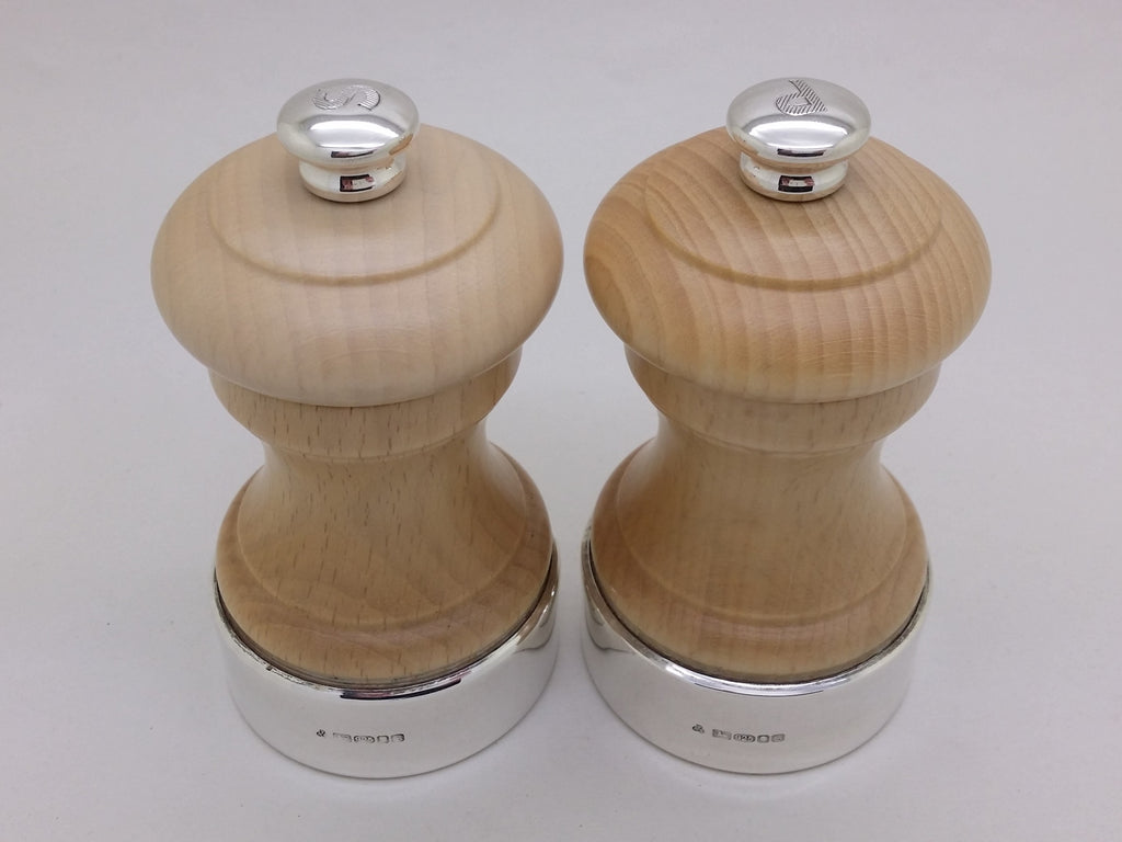 Elizabeth II 2017 pair of sterling silver mounted wooden salt & pepper mills, London by T & R Sterling Ltd