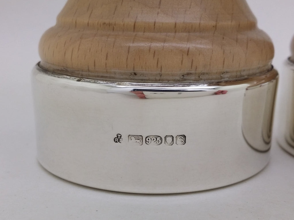 Wooden salt mill hallmarks: T & R Sterling Ltd maker's mark TRS; lion passant mark and 925 mark for sterling silver; leopard head mark for London; and UK date letter s for 2017.