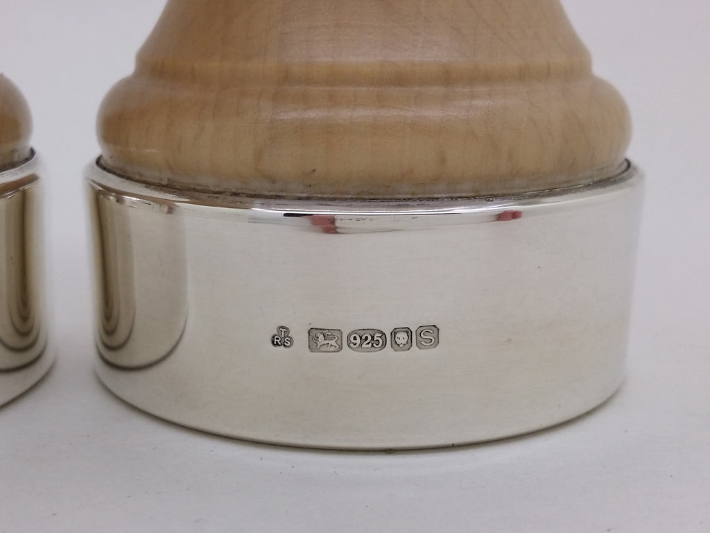 Wooden pepper mill hallmarks: T & R Sterling Ltd maker's mark TRS; lion passant mark and 925 mark for sterling silver; leopard head mark for London; and UK date letter s for 2017.