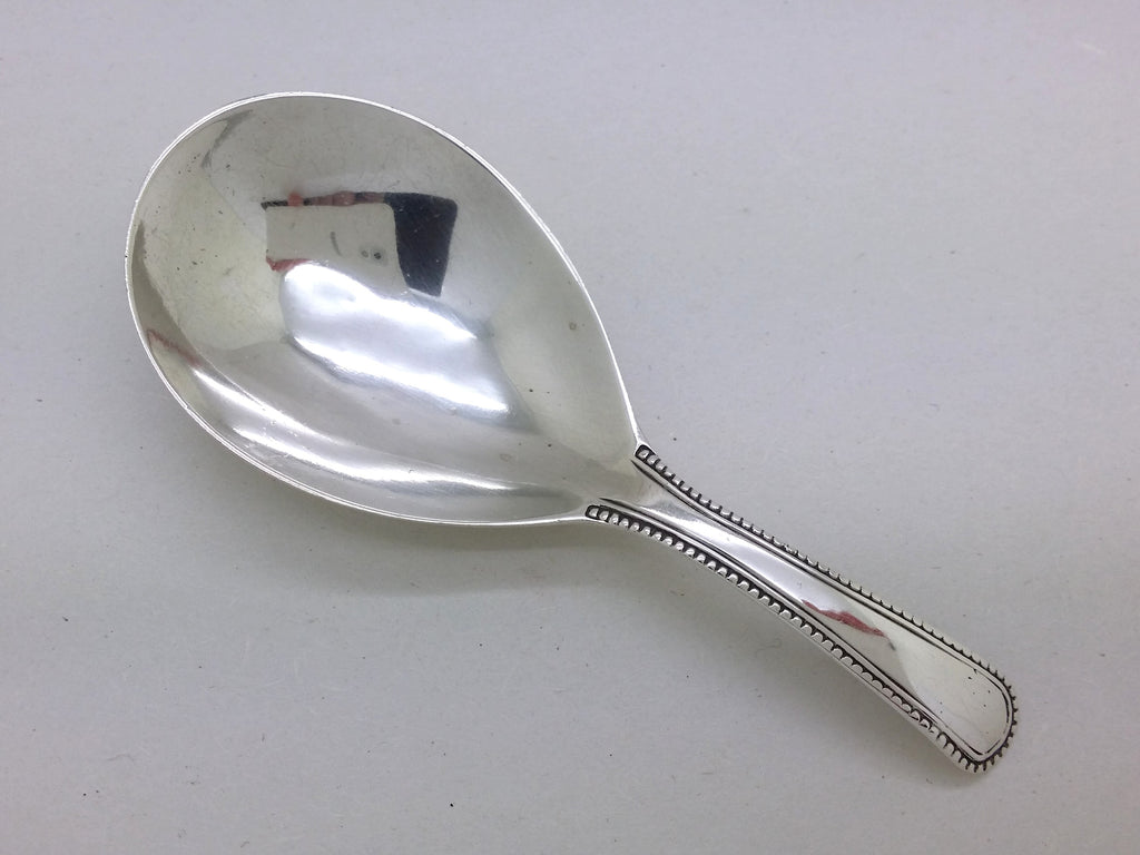 George III 1794 sterling silver beaded pattern caddy spoon, London by Thomas Wallis II