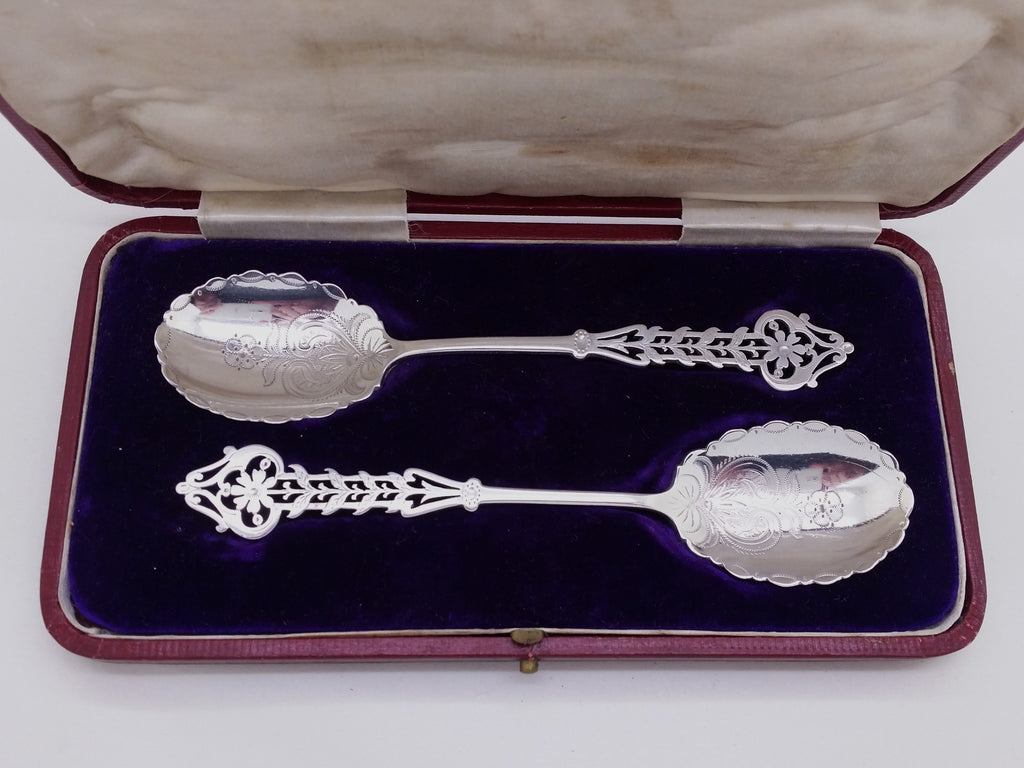 Edwardian 1903 cased pair of sterling silver sunflower jam spoons, Sheffield by Cooper Brothers & Sons.