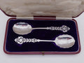 Edwardian 1903 cased pair of sterling silver sunflower jam spoons, Sheffield by Cooper Brothers & Sons.