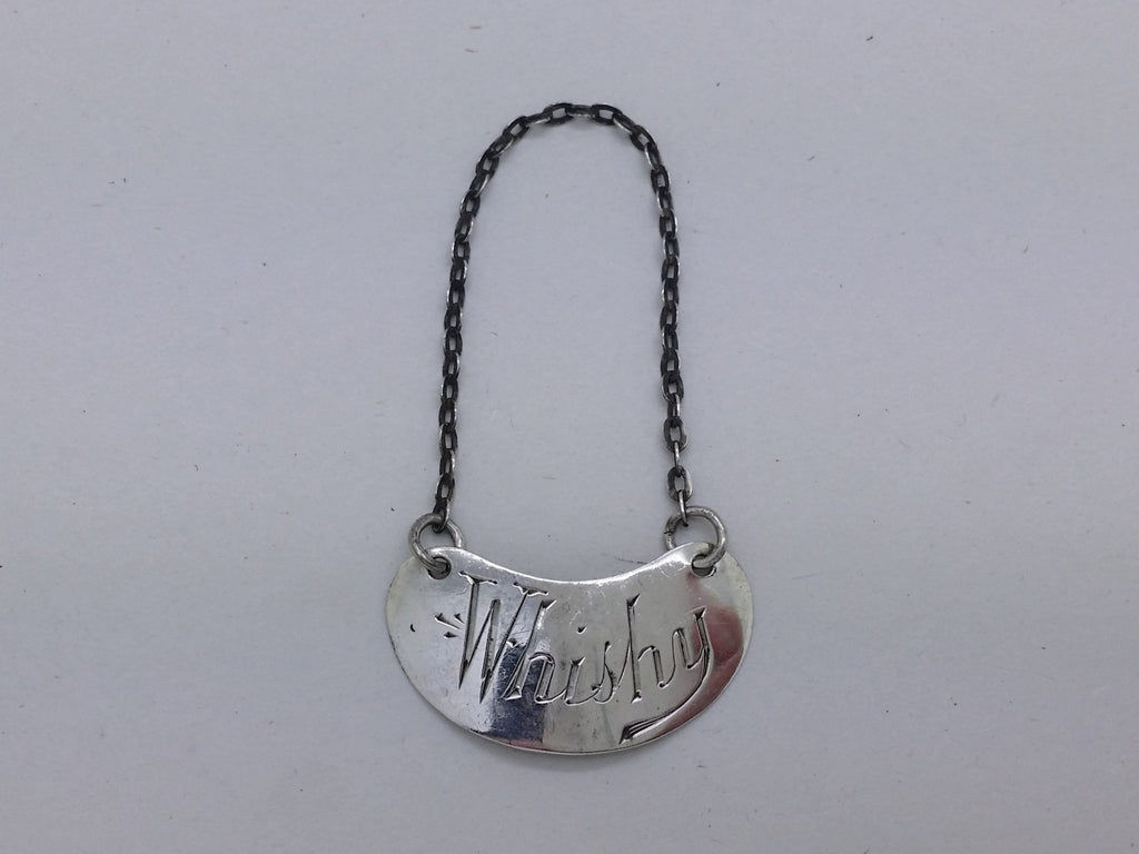 Edwardian 1908 Sterling Silver Whisky Noggin Decanter Wine Label, London by Hukin & Heath.