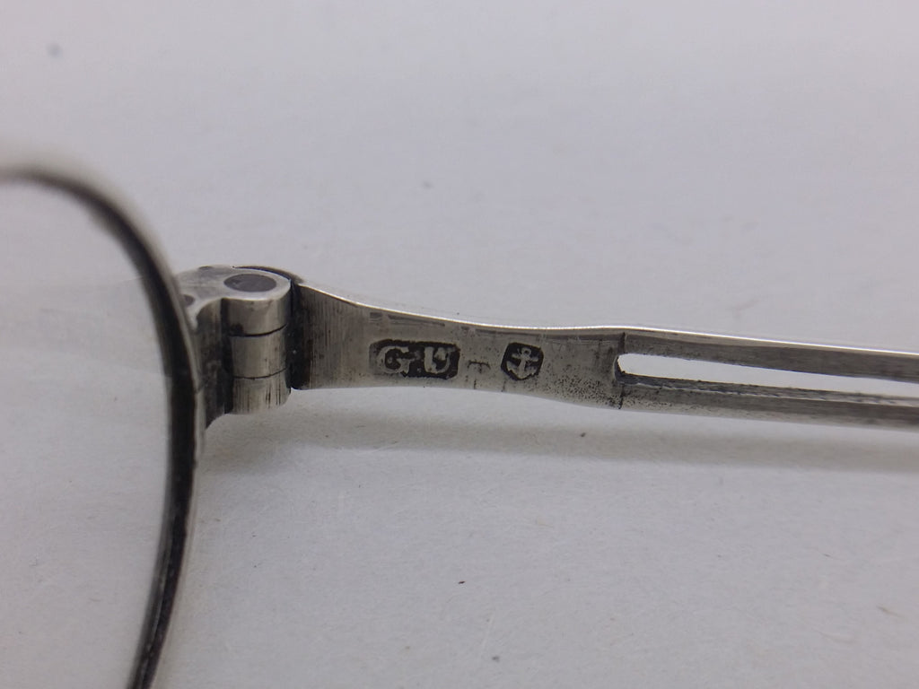 Spectacles hallmarks: George Unite makers mark GU; and anchor mark for Birmingham