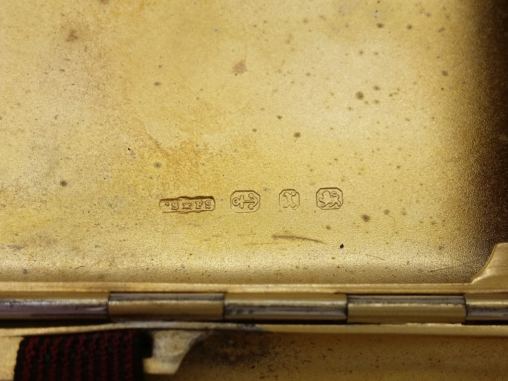 Cigarette case hallmarks: Cornelius Saunders & Francis Shepherd maker's mark CSFS; anchor mark for Birmingham; Birmingham date letter x for 1897; and lion passant mark for sterling silver.