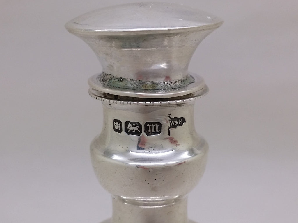 Scent bottle hallmarks: crown mark for Sheffield; lion passant mark for sterling silver; Sheffield date letter m for 1904; and Walker & Hall maker's mark W&H.