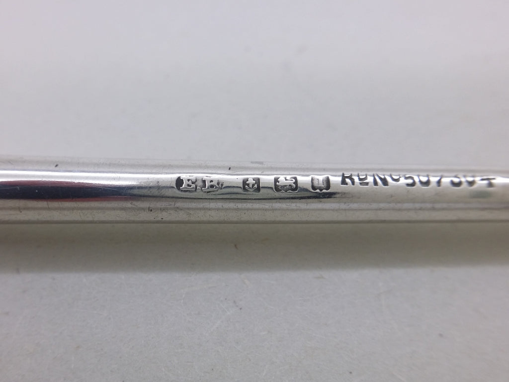 Dip pen hallmarks: Edward Baker & Son maker's mark EB; anchor mark for Birmingham; lion passant mark for sterling silver; Birmingham date letter i or l for 1908 or 1910, respectively.