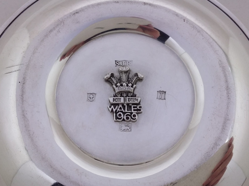 Dish hallmarks around the applied central Prince of Wales Fleur de Lys monogram: S J Rose & Son maker's mark SJR; anchor mark for Birmingham; Birmingham date letter T for 1968; and lion passant mark for sterling silver.