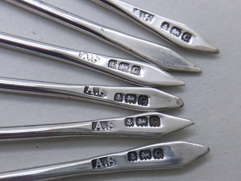 Cocktail stick hallmarks: Adolph Scott maker's mark AS; anchor mark for Birmingham; lion passant mark for sterling silver; Birmingham date letter C for 1927.