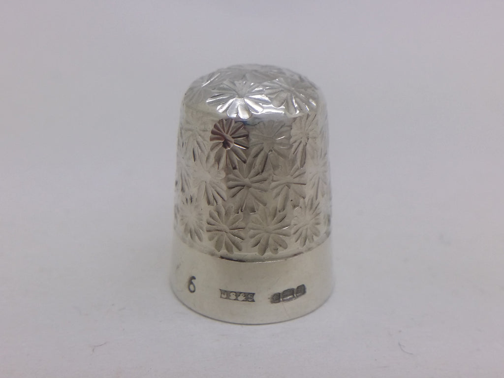 Elizabeth II 1978 sterling silver daisy thimble, Sheffield by James Swann & Son