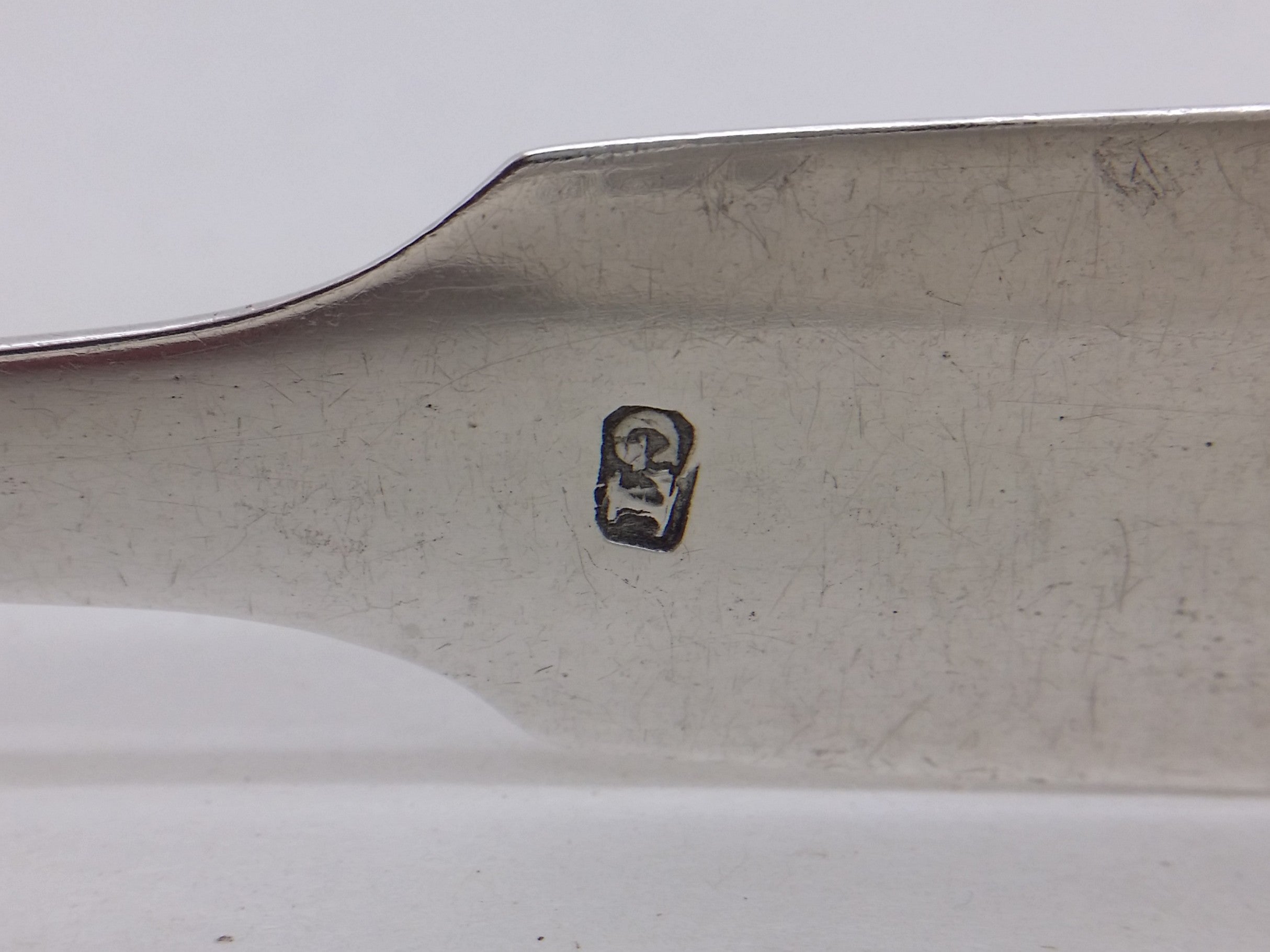 George Turner maker's mark GT on sterling silver sugar tongs.