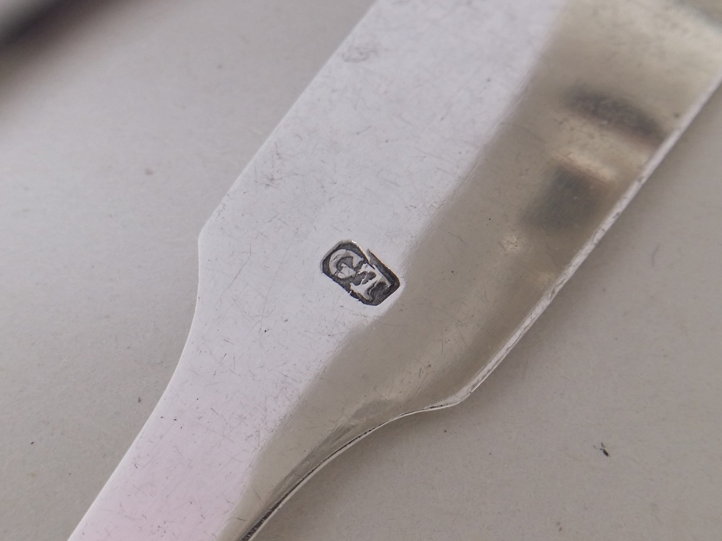 George Turner maker's mark GT on sterling silver sugar tongs.