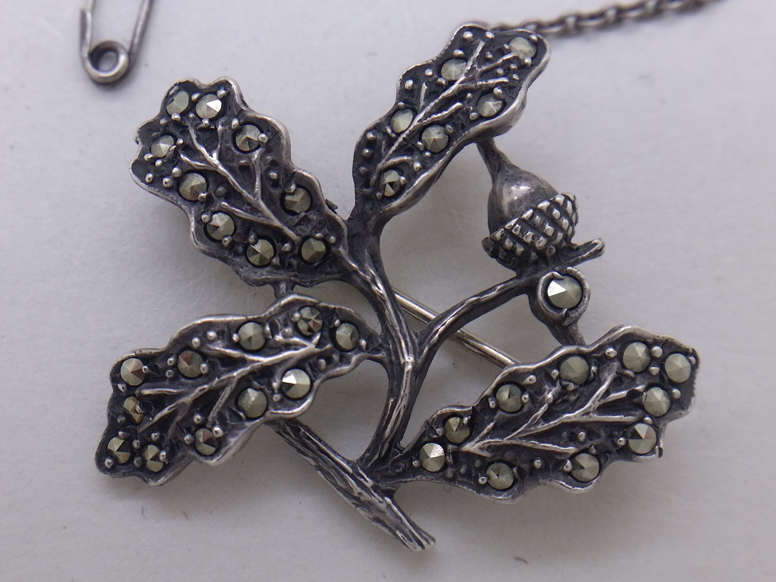 Sterling silver National Trust brooch, with inset marcasite stones.