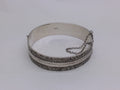 Elizabeth II 1971 sterling silver textured hinged bangle, Birmingham by Bracelon Ltd.